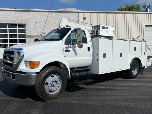 Used 2005 Ford F750 Service Truck Cummins 5.9L Feterl G2-10H Crane and Bed for sale Call for price at Midwest Truck Group in West Chicago IL